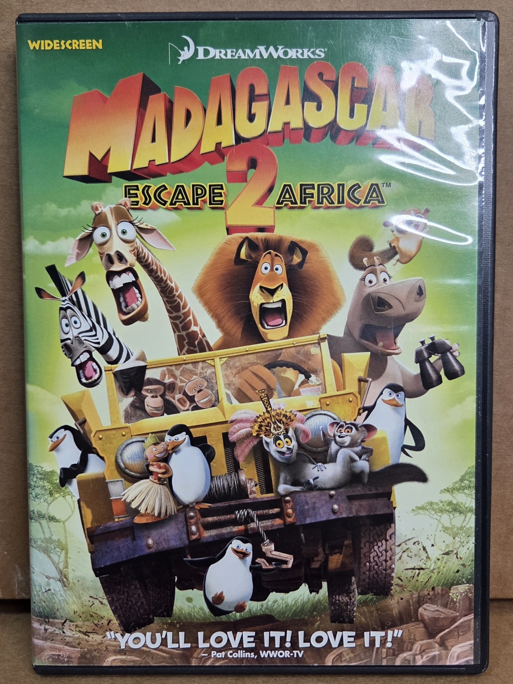 DreamWorks Madagascar: Escape 2 Africa — Vibrant Green and Yellow Cover
